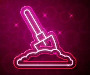 Glowing neon line Shovel in the ground icon isolated on red background. Gardening tool. Tool for horticulture, agriculture, farming. Vector