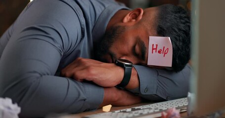 Man, night and sleeping at desk in office with fatigue, tired and rest with sticky note on head for help. Businessman, sleep and paper on forehead at table with burnout, mental health and overworked - Powered by Adobe