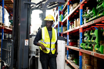 Warehouse workers checking the inventory. Products on inventory shelves storage. .Worker Doing Inventory in Warehouse. Dispatcher in uniform making inventory in storehouse. supply chain concept