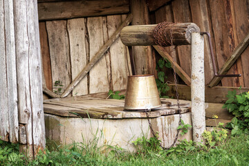 Fototapeta premium A wooden shed with a wooden lid and a wooden lid.