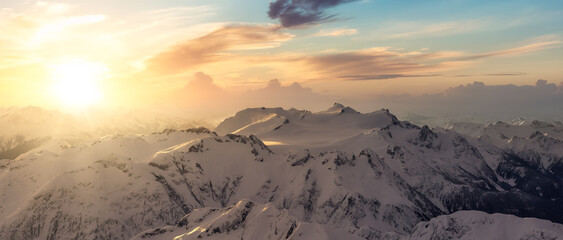 Fototapeta na wymiar Canadian Mountain Landscape Aerial Nature Background. Near Whister and Squamish, British Columbia, Canada. Sunrise Sky. Panoramic View