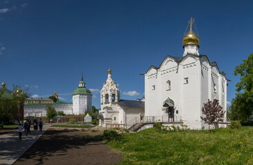 Fototapeta na wymiar Sergiev Posad. Russia. June 07, 2022. Architecture of the Orthodox Church of the Most Holy Theotokos and Paraskeva the Great Martyr at the fortress walls of the Trinity-Sergius Lavra.