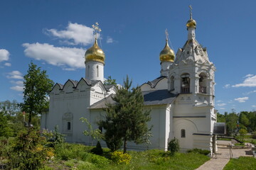 Fototapeta na wymiar Sergiev Posad. Russia. June 07, 2022. Architecture of the Orthodox Church of the Most Holy Theotokos and Paraskeva the Great Martyr at the fortress walls of the Trinity-Sergius Lavra.
