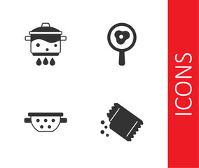 Set Packet of pepper, Cooking pot on fire, Kitchen colander and Fried eggs frying pan icon. Vector