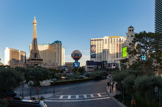 Las Vegas, United States - November 23, 2022: A picture of the Paris Las Vegas and the Planet Hollywood Las Vegas Resort and Casino, with the Eiffel Tower and the Balloon Sign on the left.