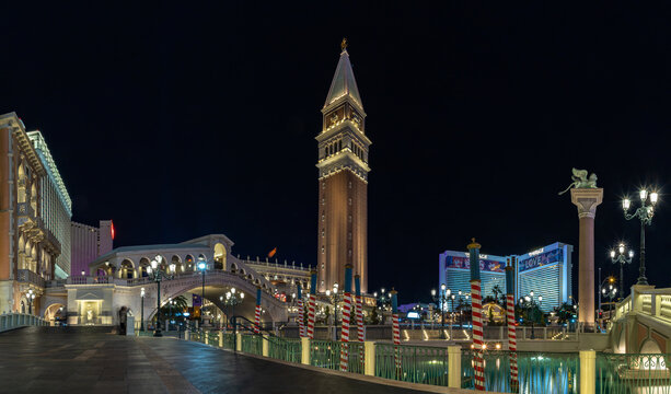 Las Vegas, United States - November 23, 2022: A picture of the Venetian Las Vegas at night, with the Rialto Bridge on the left and the Campanile Tower at the center.