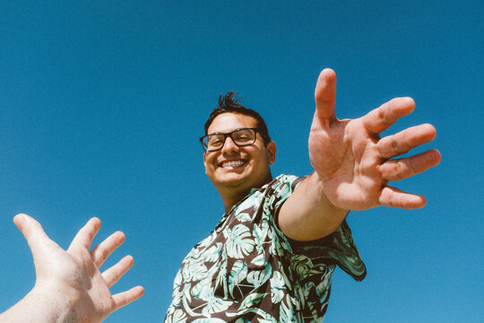 hispanic man high five