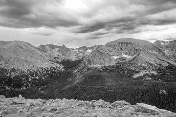 Approaching storm over Colorado's Rocky Mountain Nation Park in autumn black and white conversion.