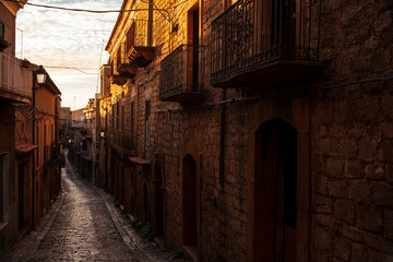 Plakat Street with old houses at Aidone, Enna province, Sicily in Italy