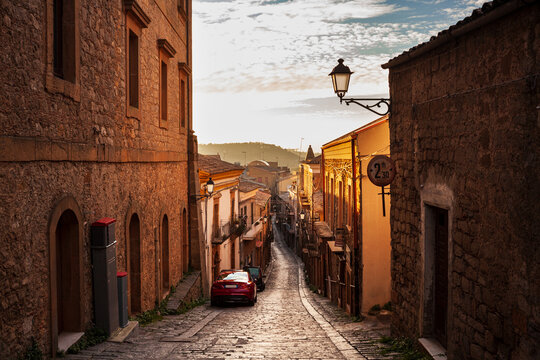 Street with old houses at Aidone, Enna province, Sicily in Italy