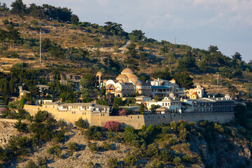 Fototapeta na wymiar Distance view of a Monastery of Archangel Michael in Greece, Thassos Island