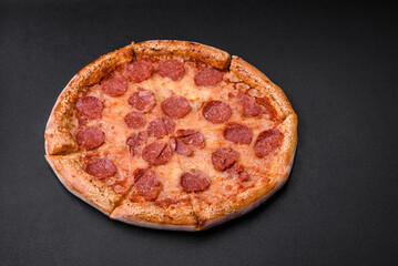 Delicious fresh pepperoni pizza with sesame seeds on the sides