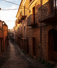 Fototapeta na wymiar Street with old houses at Aidone, Enna province, Sicily in Italy