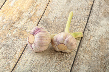 Two Young garlic over background