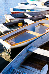 Fototapeta na wymiar Wooden boats tied to a dock