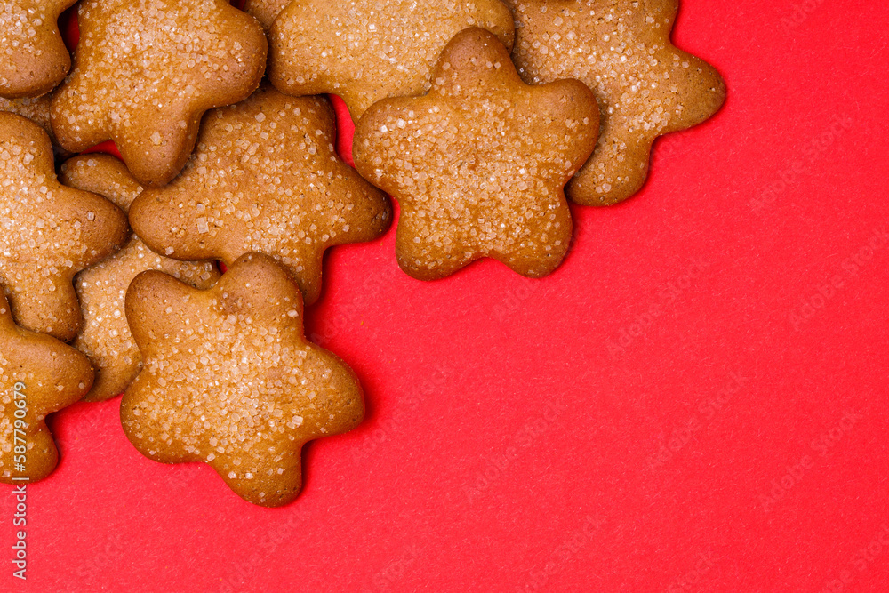 Poster cookies in the shape of stars on a red