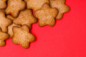 cookies in the shape of stars on a red
