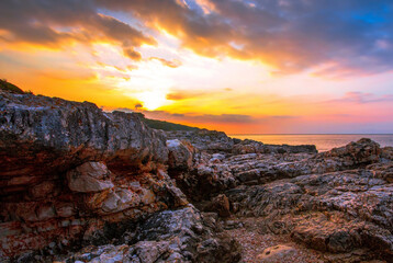 rocky coast in Croatia, wonderful sunset view, Kamenjak cape (Premantura peninsula), Pula, Istria, Croatia, Europe	