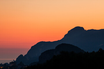 Beautiful red sunset over Liapades Beach, Corfu, Greece