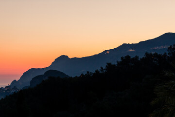 Beautiful red sunset over Liapades Beach, Corfu, Greece