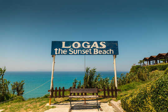 Sign in front of the beautiful Logas the Sunset Beach, Corfu, Greece