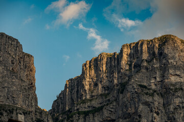 Rock walls of Vikos Gorge seen from Papingo Mikro traditional greek mountain village, Greece