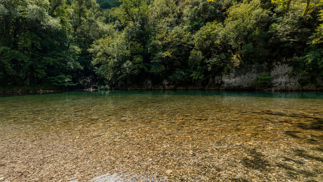 Mikro Papingo, Grece - July 15, 2020 - Voidomatis river near Papingo bridge in Pindus Mountains