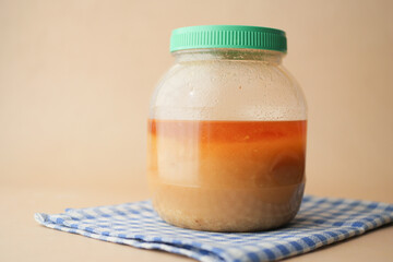 homemade ghee in container on a table ,