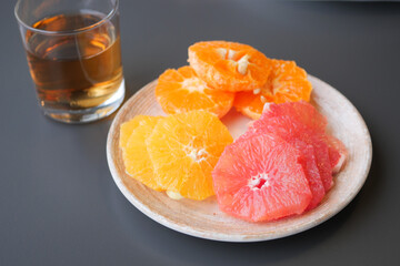 Fresh grapefruits on a plate 
