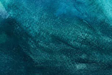 Hand drawn watercolor textured background with spots, dots and splashes in dark green blue colors as design element. Abstract contrast backdrop with copy space