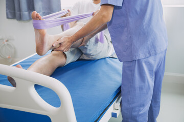 Patient doing some special exercises under supervision in a room