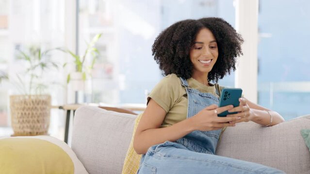 Happy, woman and scroll on smartphone couch and lounge for reading social media post, online chat and search. Young female typing on cellphone in house, smile and download mobile games, relax or text