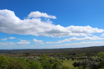 Fototapeta na wymiar blue sky and clouds over the outsides of Madrid, Spain