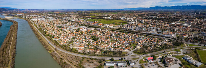 Aerial view of the city Bourg-lès-Valence in France on a sunny day in early spring.