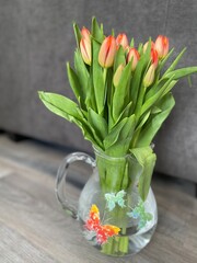 Spring tulips in a glass vase