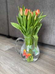 Spring tulips in a glass vase