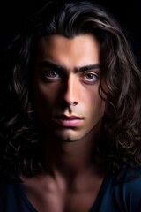 portrait of a Man with long brown hairs & eyes