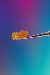 Live Resin sauce on a colorful background