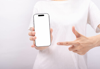 Female hands taking photo with smart phone of blank white touch screen, front view, isolated on white.