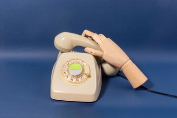 Still life concept communication with Rotary dial and mannequin hand