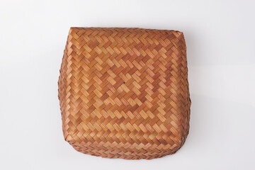 Besek is Indonesian traditional food box made of woven bamboo for store goods or food