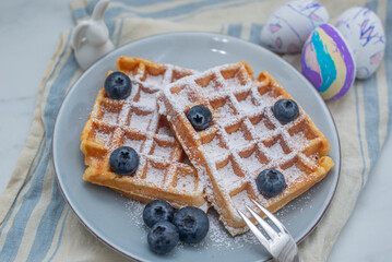 sweet home made carrot easter waffles on a table