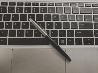 laptop and pen