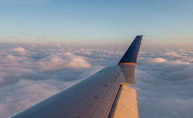 Fototapeta na wymiar airplane wing in the sky
