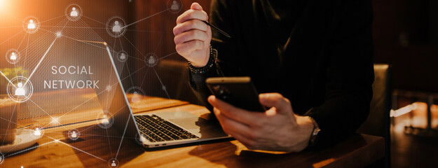 Virtual reality of social networks. A man uses a modern hologram to communicate with people around the world