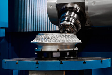 Five-axis milling machine makes turbine wheel at plant
