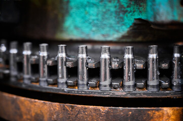 Shell casings transported by vintage equipment at plant