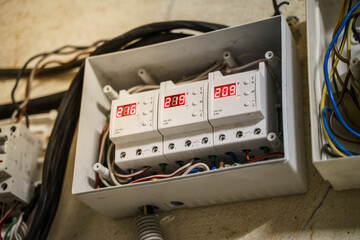 Voltage relay with indication of incoming voltage and residual current device in the switchboard on...
