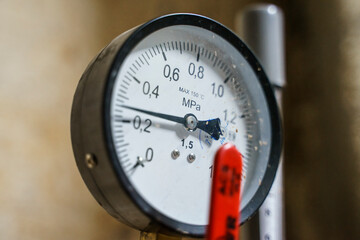 Pressure manometer for measuring installed in water or gas systems. focus on the pressure manometer. Plumbing equipment.