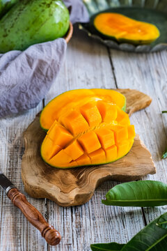 mangga arum manis or mango on a wooden table